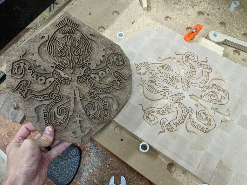Inlay process in progress: walnut insert and maple pocket for the kraken design cutting board