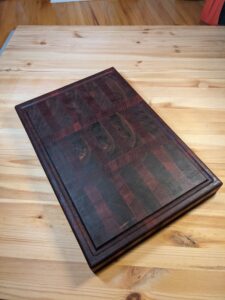 Plaid-style cutting board with padauk and walnut